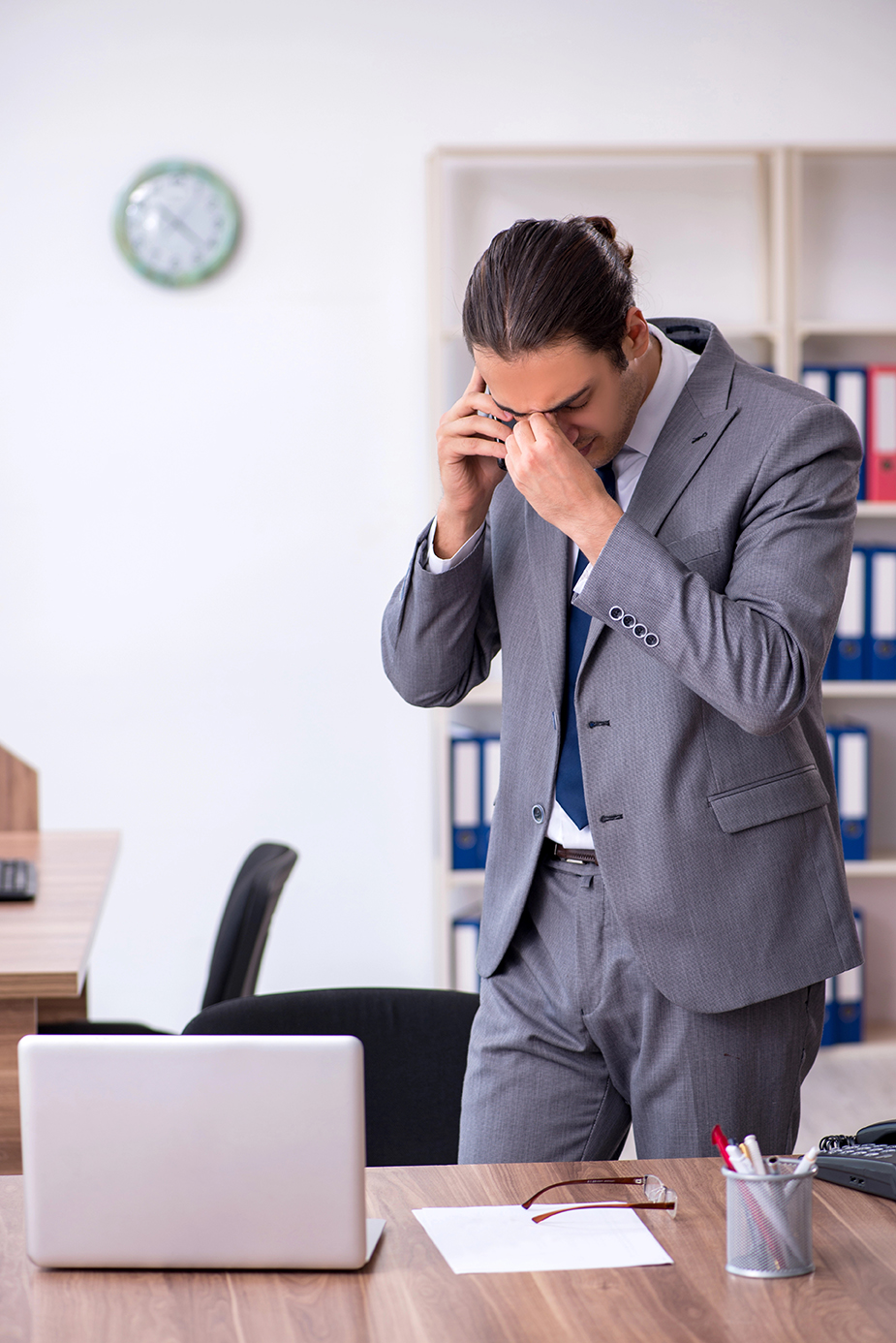 Unhappy male businessman in the office